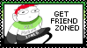 A stamp with a green, lime, white, grey and black border, that displays the same character, this time wearing a sweater colored like the Aromantic flag, with to the right the text 'GET FRIEND ZONED'.